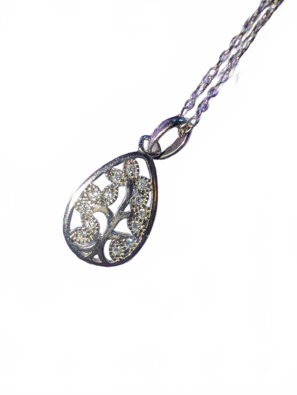 Silver Teardrop Pendant Necklace with Intricate Filigree Design